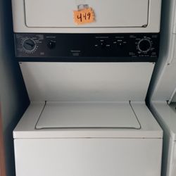 KENMORE STACKABLE CENTER WASHER AND DRYER WORK GREAT INCLUDING WARRANTY DELIVERY AVAILABLE