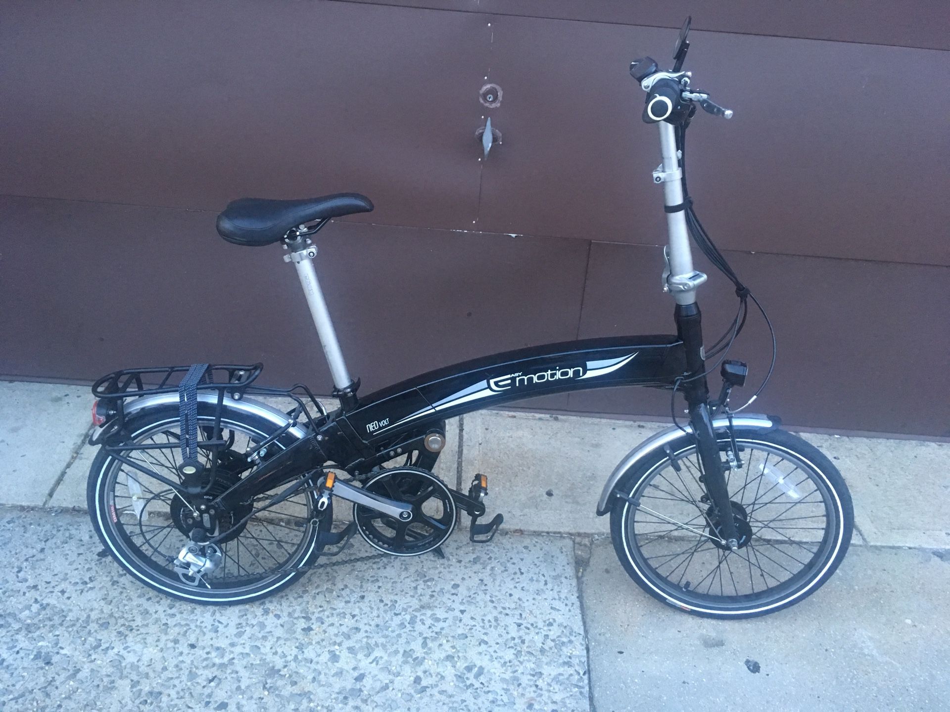 Easy motion neo volt electric folding bicycle