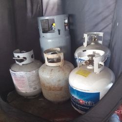 PROPANE CANISTERS FOUR 5 GALLON (EMPTY) ONE 10 Gallon (Full)