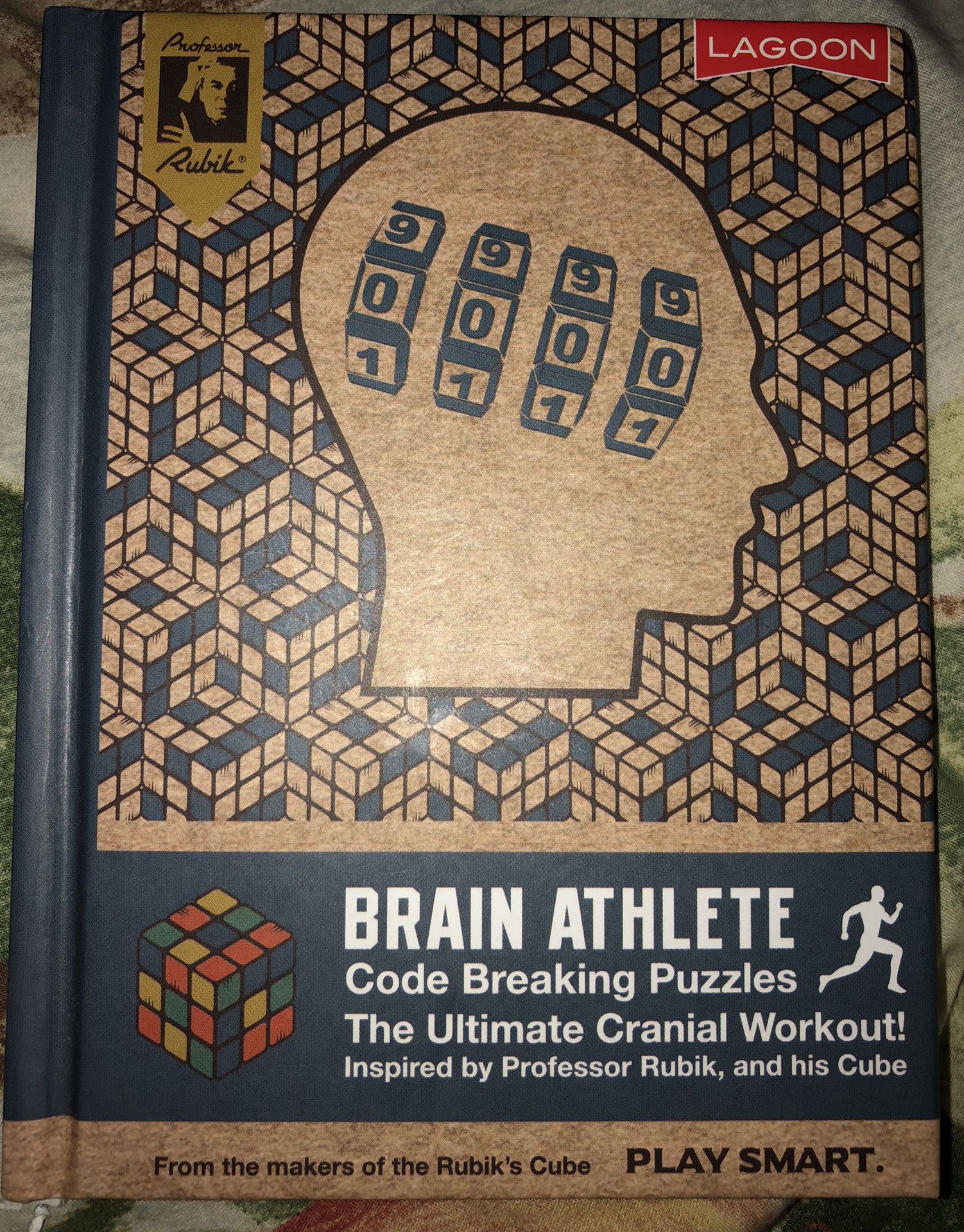Brain Athlete Book made by Rubik’s Cube. Has games- code breaking puzzles - riddles to solve... Great secret Santa gift or stocking stuffer.