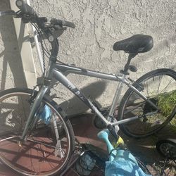 Free Trek Bike And Like New Rug