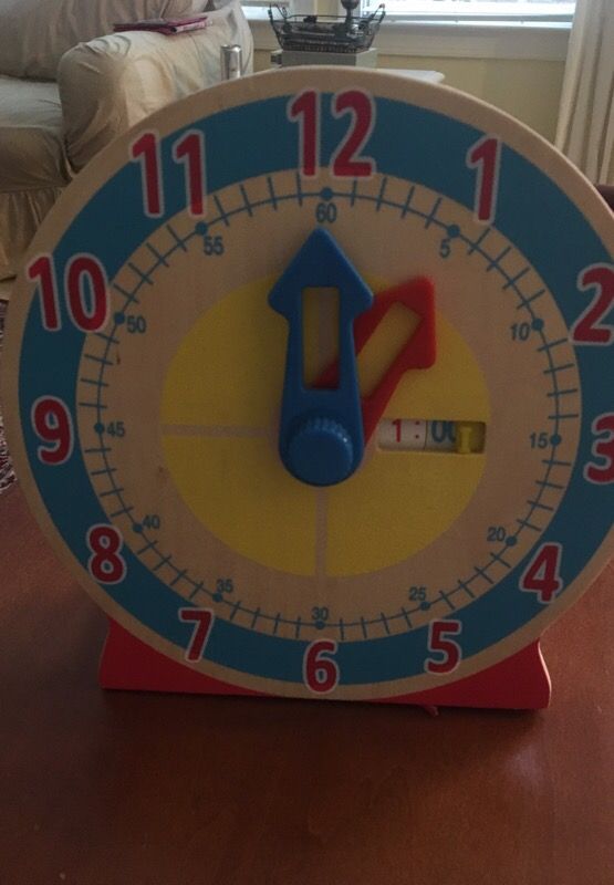 Melissa and Doug wooden tell time clock