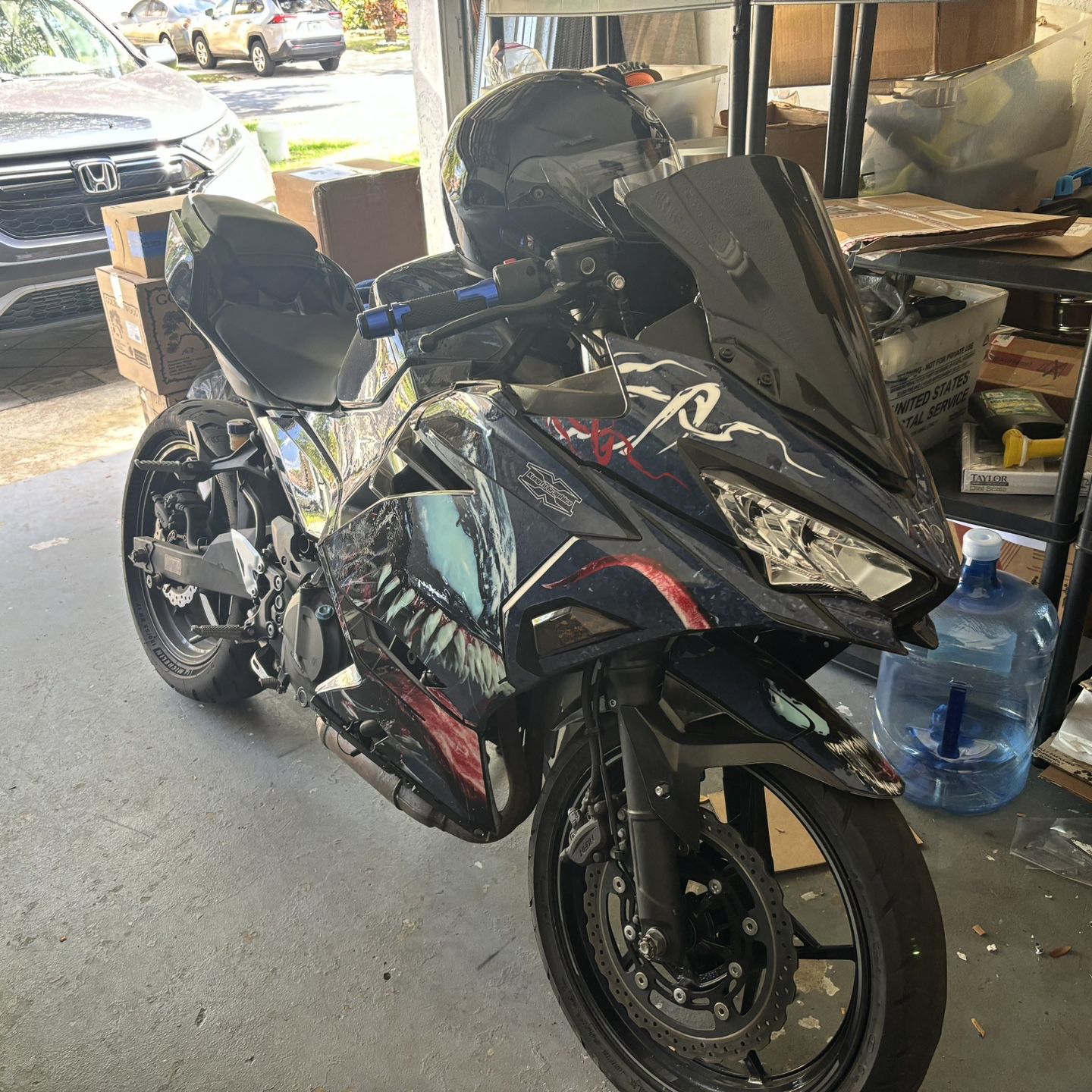 Unleash the Beast: Limited Edition Kawasaki Ninja 400 Motorcycle with Custom Venom Decals