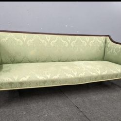 Antique Chippendale style mahogany framed upholstered sofa; 75" wide