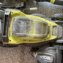 Ryobi 18 v 13 Inch Lawnmower/ Weed Eater / Blower Combo. Charger And Batteries Comes With Package. Everything Works Great. 