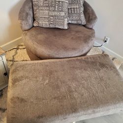 Ashley Furniture swivel accent chair and oversized ottoman