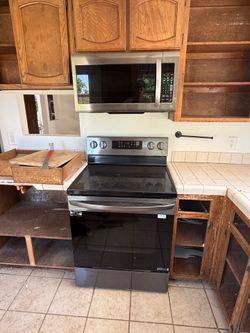 Refrigerator, stove, dishwasher, microwave, garbage disposal