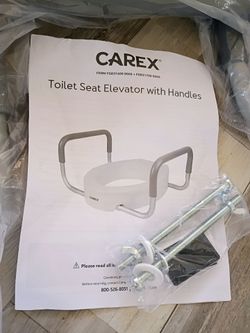 BRAND NEW CAREX elevator toilet seat with safety handles
