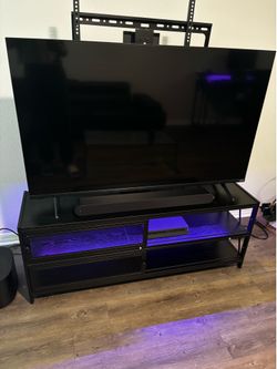 55-60” TV Stand (With LED lights and adjustable mount)