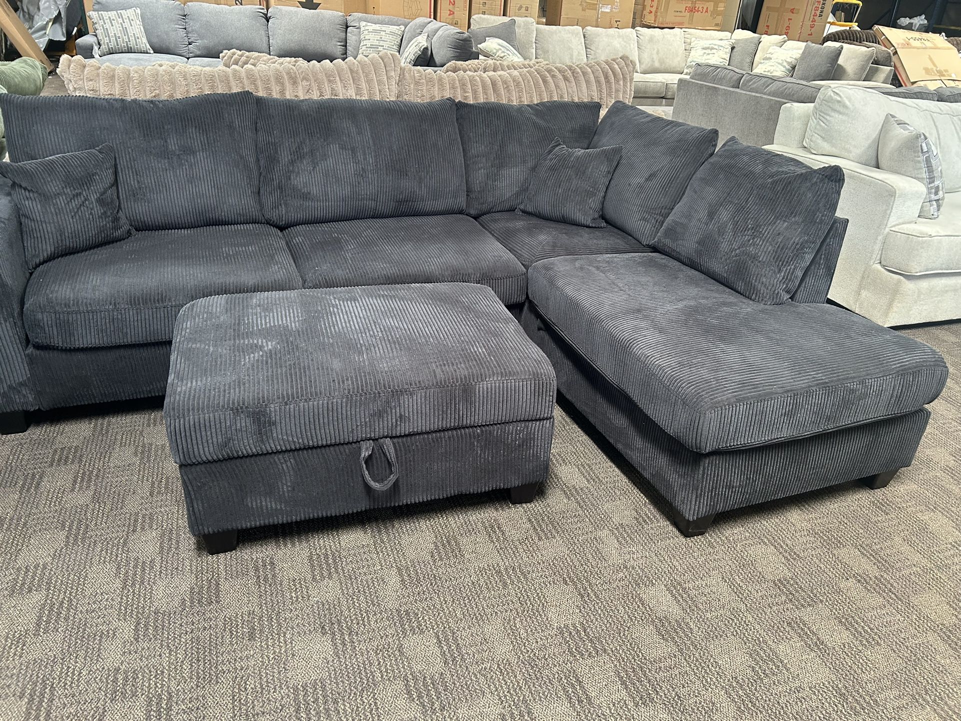 Black Sectional W Storage Ottoman