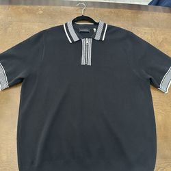Black and white striped polo shirt zip-up