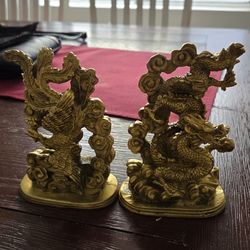 Brass dragon and eagle statues