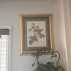 Vintage gold frame with rose