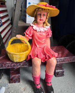 Girl on bench garden ornament