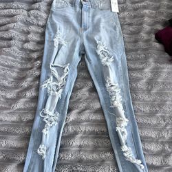 Fashion Nova ripped jeans 