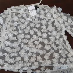 White floral sheer top with 3D flower design.