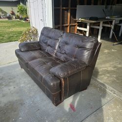 Leather Love seat Couch. .FREE