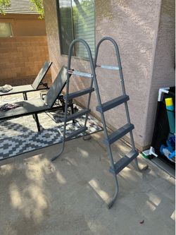 Above ground pool ladder and pool skimmer