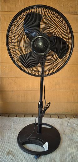 Lasko Black Pedestal Standing Fan, Adjustable Height..Works Good.