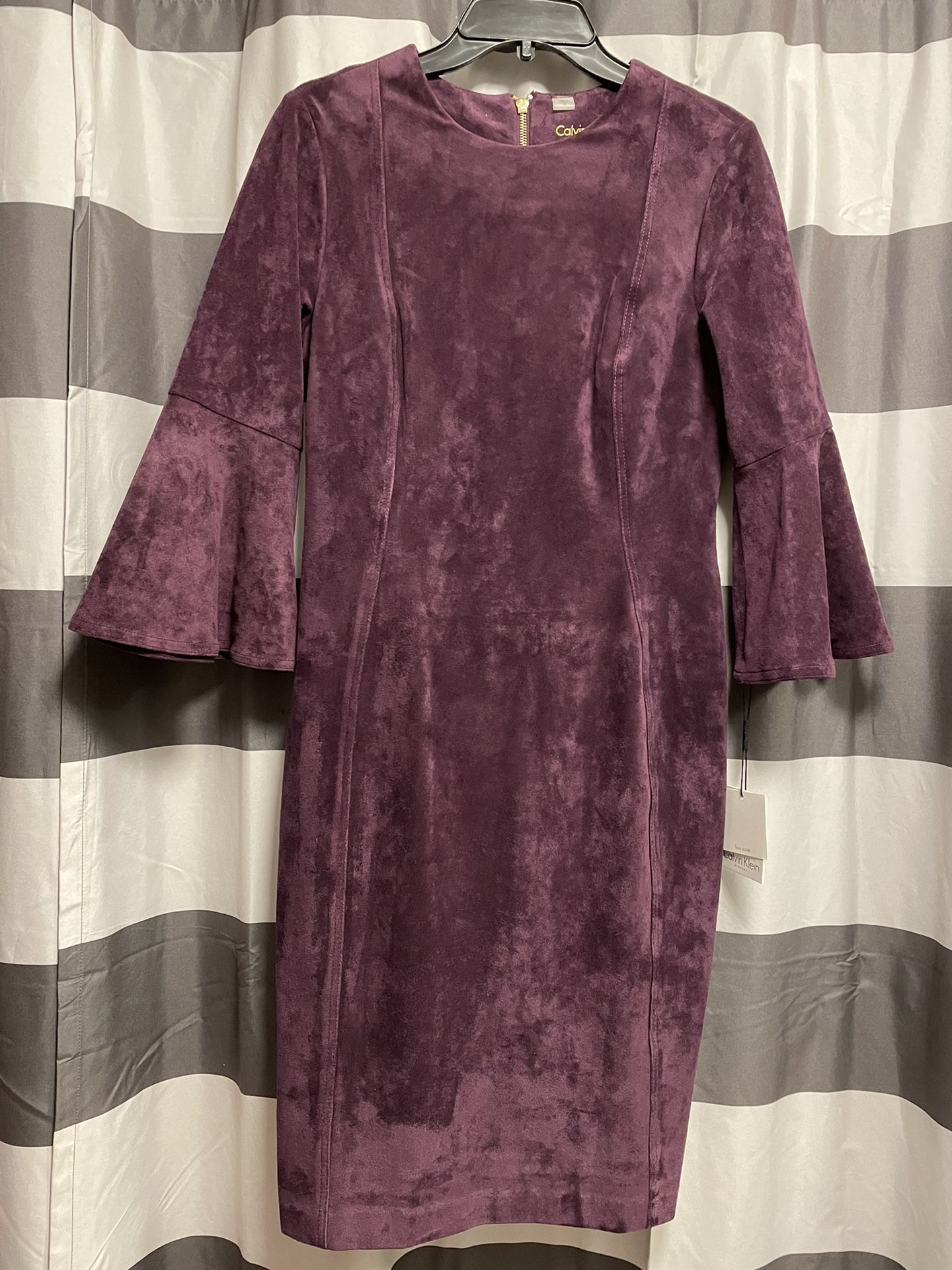 Brand new Gorgeous Calvin Klein bell Sleeve dress