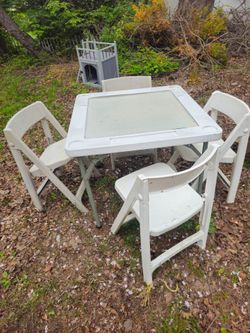 Price is firm.. folding outdoor Domino's / card table