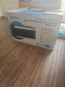 Midea brand new microwave  in box