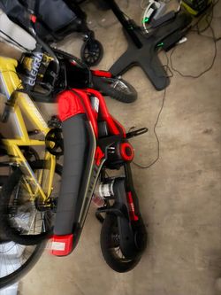 Red and Black Electric dirt bike