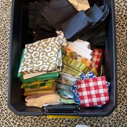 Bin Of Festive Napkins And Plates 