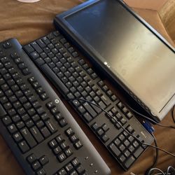 Monitor and 2 Wired Keyboards