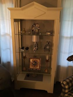 White shelves. Two matching with lower drawer are 75 each. White cabinet with glass shelves is 50. Prices are firm. Cash and carry. Items on she