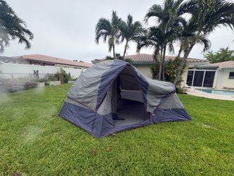 Large nylon tent with side cropping for sale, includes fly, poles, stakes and bag