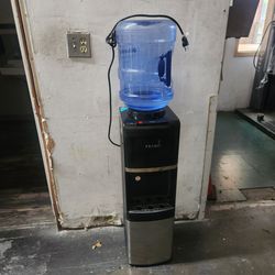 Used Primo hot and cold water dispenser