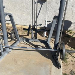 Used weight machine and weights and chair