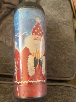 Santa themed Starbucks tumbler.