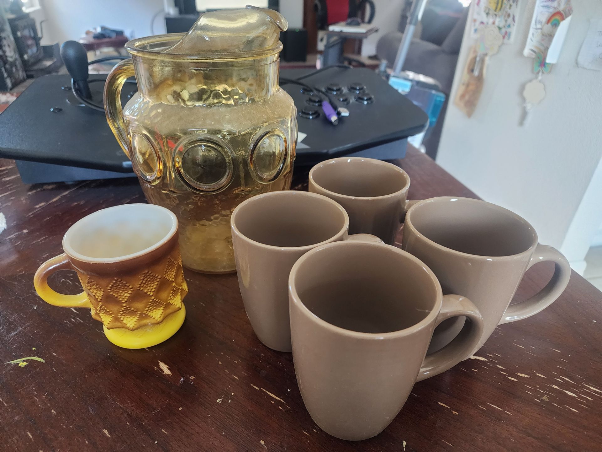 Drinking glasses and pitcher