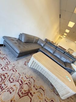 Chateau Dax cortisa-2 pc leather sectional sofa. Retail price $5822, our price $2499.