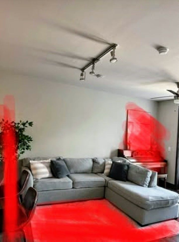 Gray Sectional Sofa with Pull-Out Queen Bed – Removable Covers – Good Condition