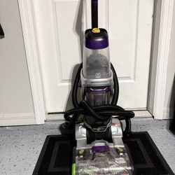 Machine for washing carpets, rugs and sofas.