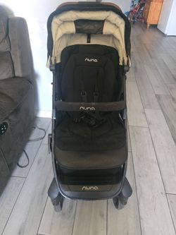 Nuna Infant Car Seat with Base and stroller
