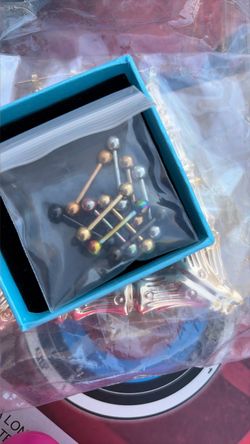 Tongue piercing rings