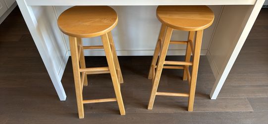 Two wooden barstools