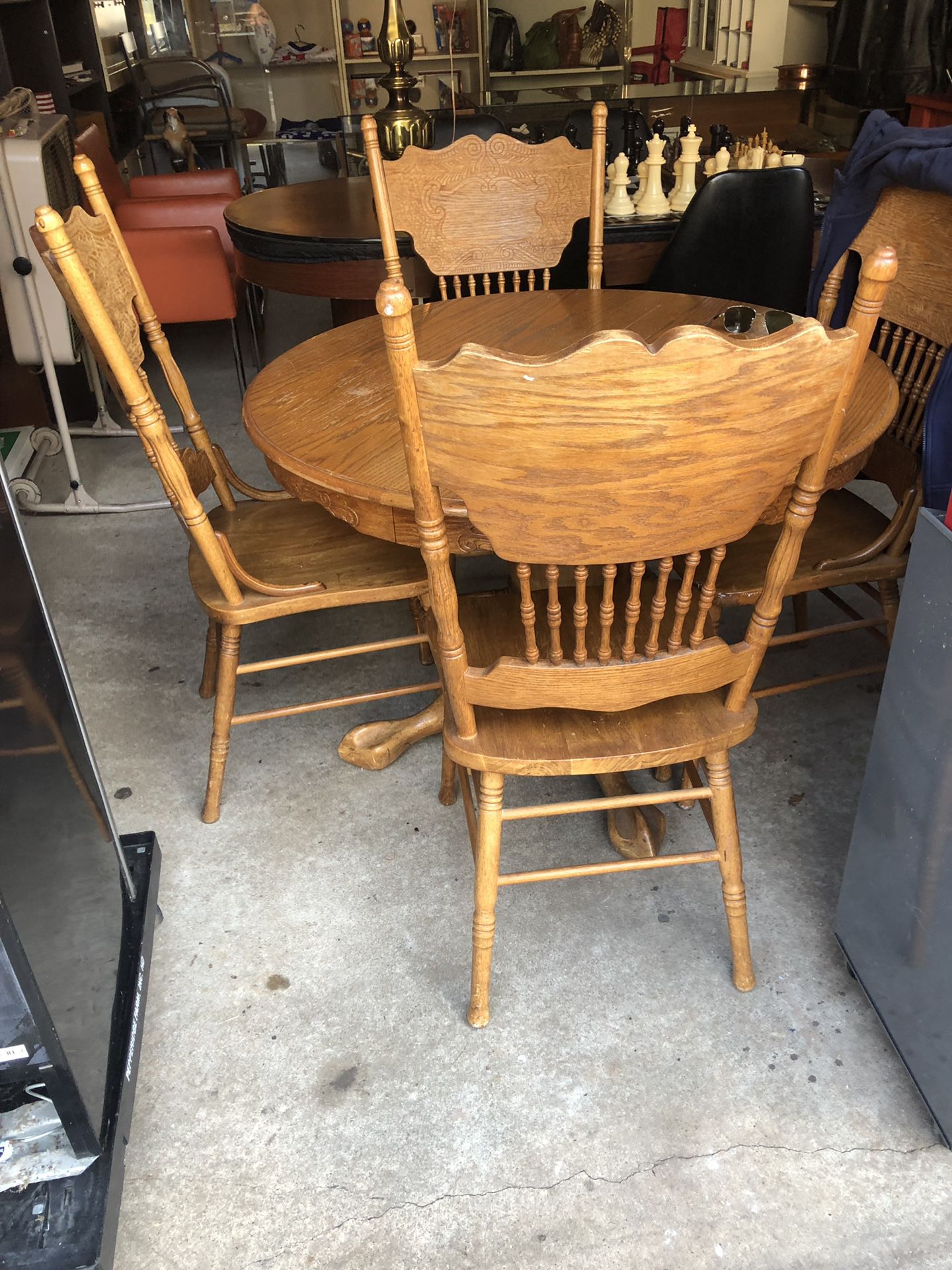 Vintage dining table with four chairs and extension to make table bigger solid piece