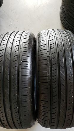 Land sport in great condition 2 tires 215 55 17 80% treated