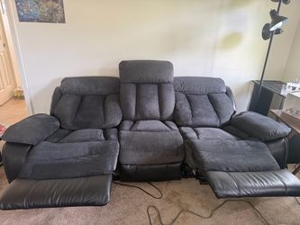 Two double recliner couches - electric (must pick up)