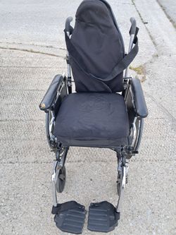 Cushioned Wheelchair for Child or smaller Adult with Seatbelt