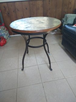 Circular end table used in Warrenville