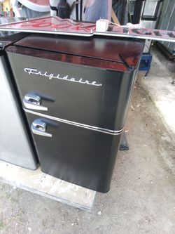 Frigidaire mini refrigerator/with top freezer