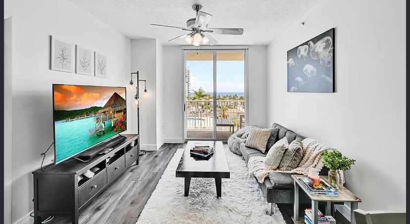 Gray Futon Couch With Side Tables