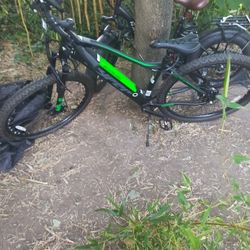 2 Bikes one is A 36 V Electric Assistshimano