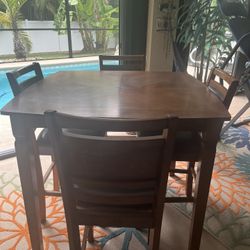 4 Chairs And Dining Table